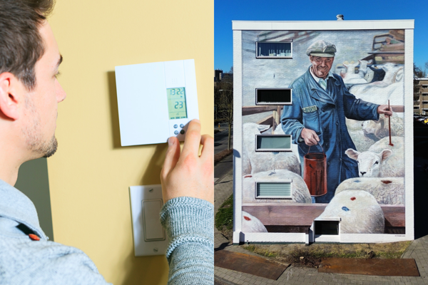 Bewoner draait aan de thermostaat en kunstwerk op een woongebouw